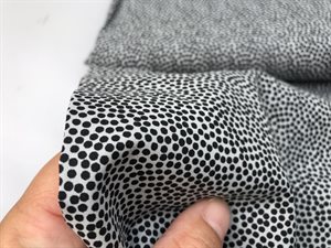 Poplin - ujævne prikker i blid grå / sort